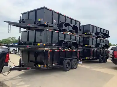 Dump trailers stacked for delivery