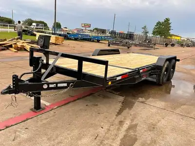 Black equipment trailer, wood deck