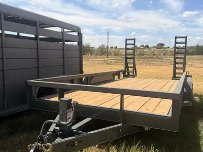 Charcoal equipment trailer with ramps