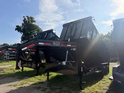 Gooseneck dump trailer with the J&C decal