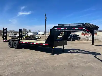 Black gooseneck with stand-up ramps and toolbox