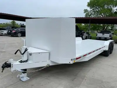White car hauler with rock shield and toolbox