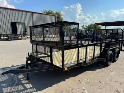 Landscape trailer with mesh sides and racks