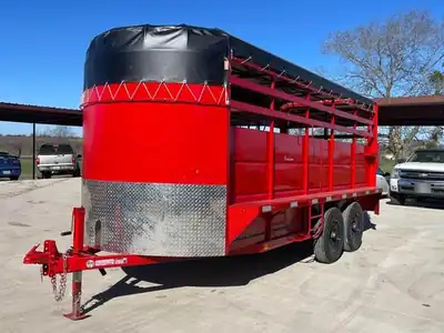 Red livestock trailer, diamond-plate nose
