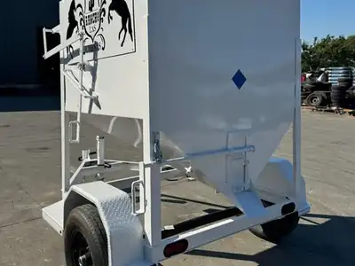 Feeder trailer painted with a customer's ranch brand