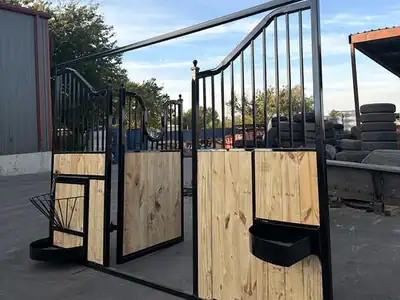 Black stall front with feeders