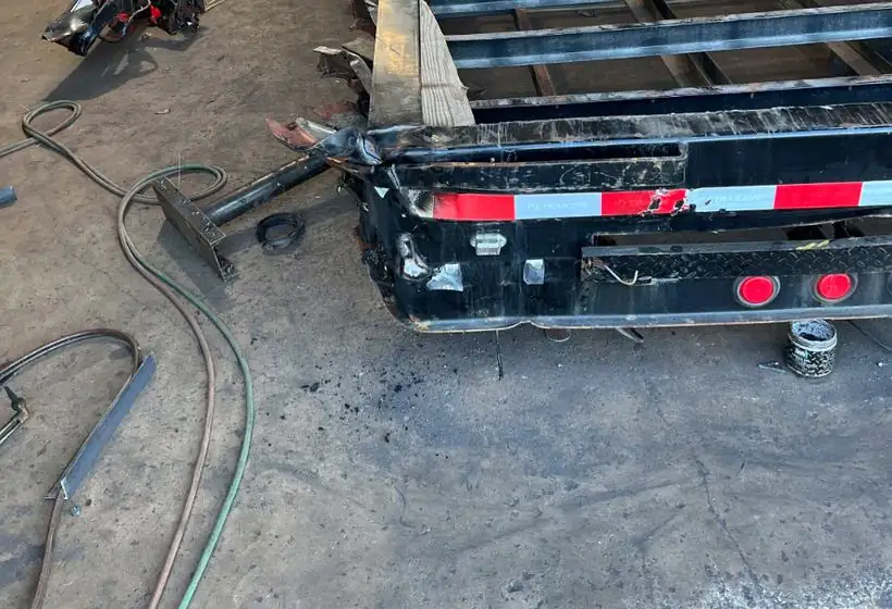 A trailer frame being rebuilt in the J&C repair shop
