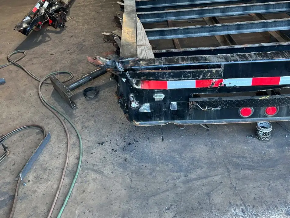 Before: old deck stripped off the trailer frame